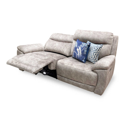 Side profile of the ‘Sloane’ power recliner sofa, highlighting the ergonomic curvature of the high backrest, cushioned armrests, and wall-clearance requirements when fully reclined.