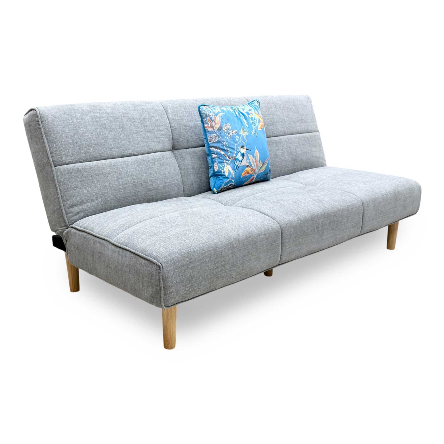 Side profile of the ‘Miyagi’ fabric futon, highlighting its neat armless silhouette and perfectly angled backrest designed for compact living spaces.