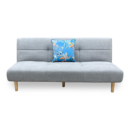Front view of the Furniture Village ‘Miyagi’ Futon Sofa Bed in Mist Grey fabric, displaying its clean scandi-minimalist lines, deep buttoned tufting, and light wood tapered legs.