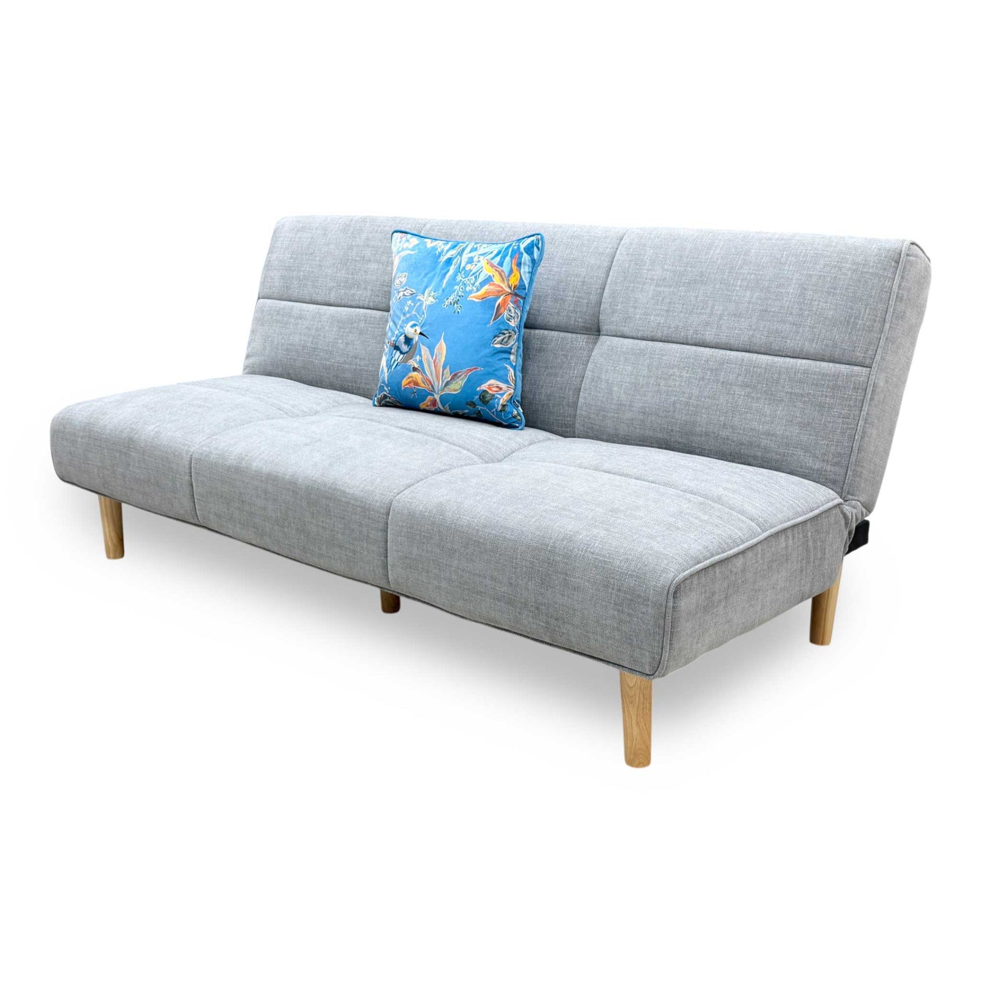 Side profile of the ‘Miyagi’ fabric futon, highlighting its neat armless silhouette and perfectly angled backrest designed for compact living spaces.