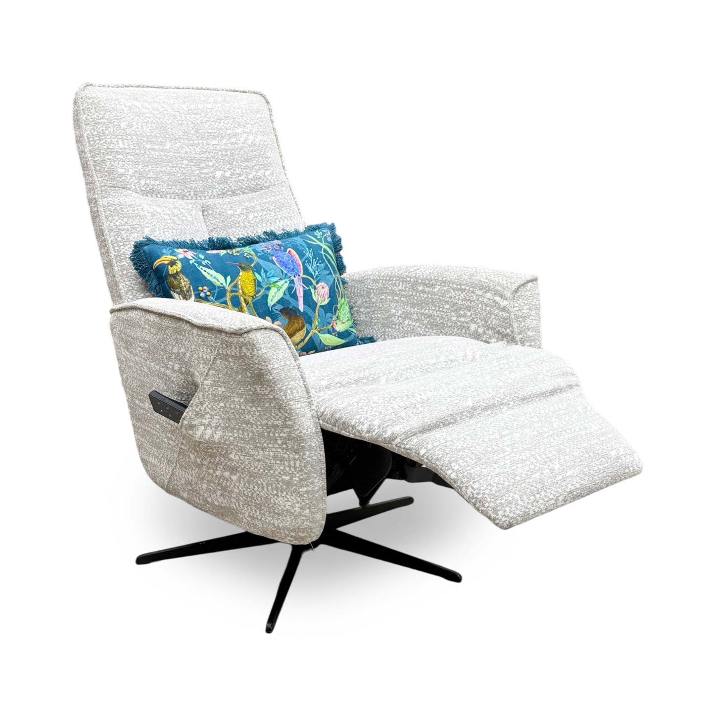 Side profile of the ‘Maribo’ fabric recliner chair, highlighting its sleek, low-profile track arms, discrete side handset pocket, and clean-lined contemporary silhouette.