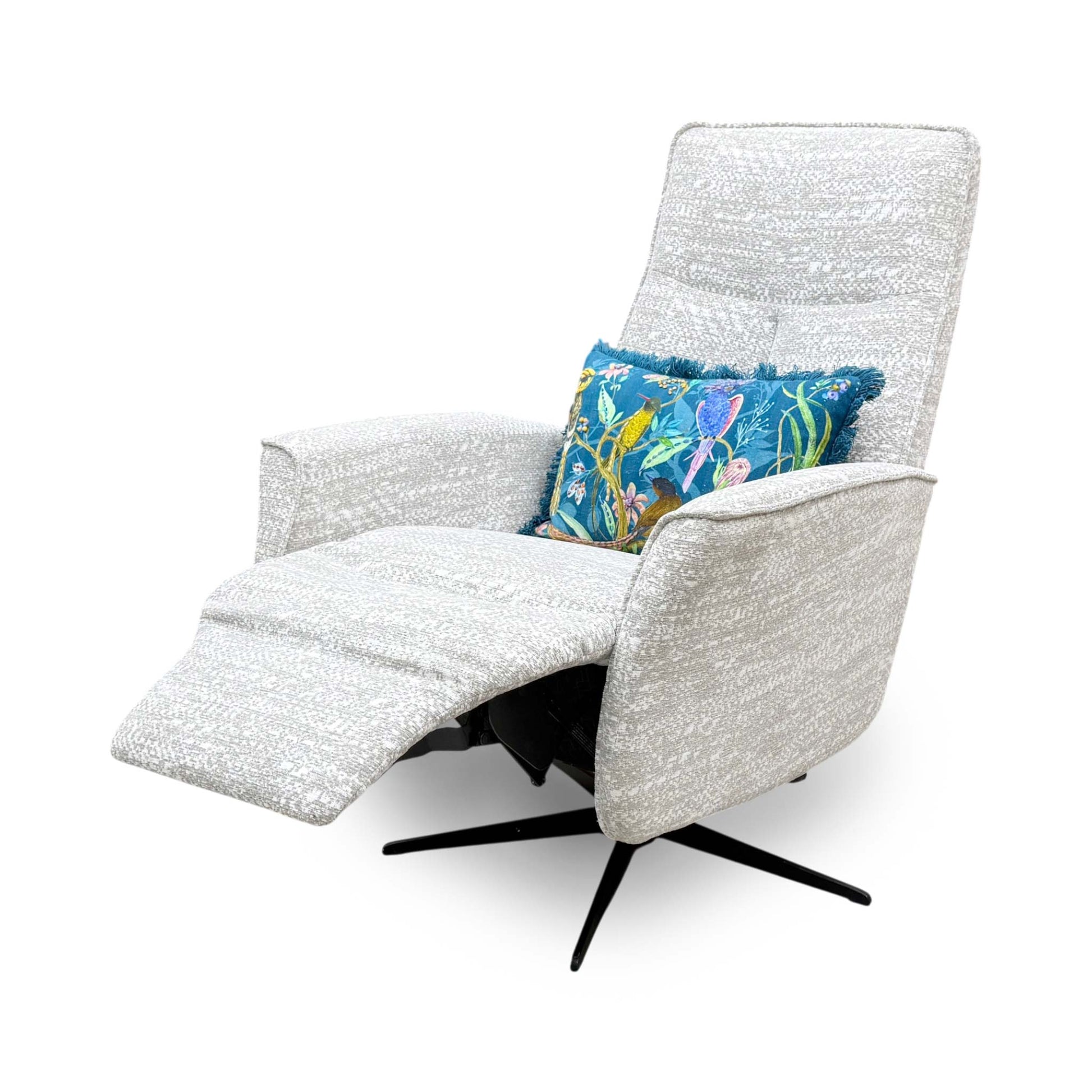 Side profile of the ‘Maribo’ fabric recliner chair, highlighting its sleek, low-profile track arms, discrete side handset pocket, and clean-lined contemporary silhouette.