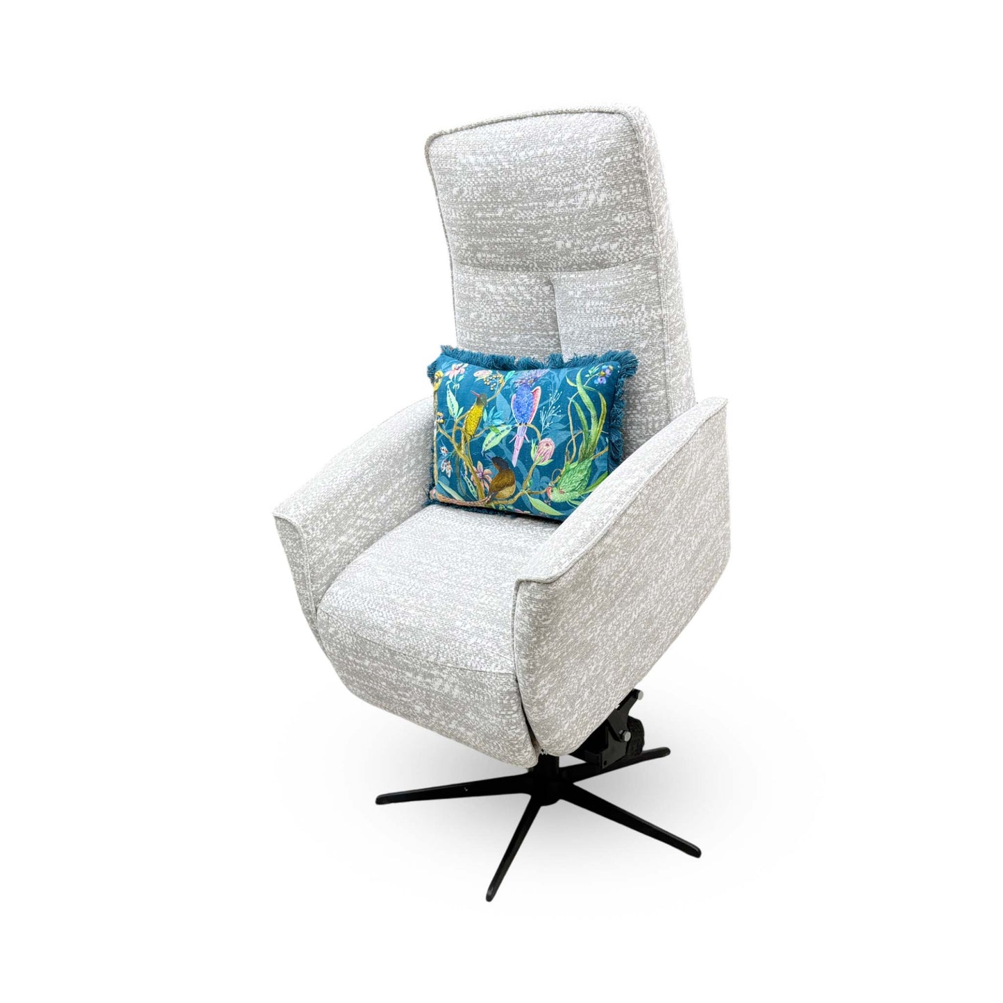 Side profile of the ‘Maribo’ fabric recliner chair, highlighting its sleek, low-profile track arms, discrete side handset pocket, and clean-lined contemporary silhouette.
