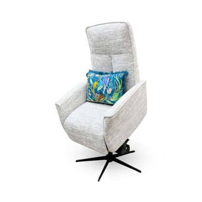 Side profile of the ‘Maribo’ fabric recliner chair, highlighting its sleek, low-profile track arms, discrete side handset pocket, and clean-lined contemporary silhouette.
