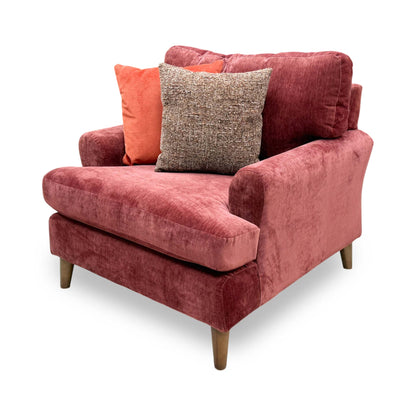 Side profile of the ‘Jackson’ armchair, highlighting its neat, square track arms and perfectly balanced, structured back design.