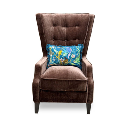 Front view of the Furniture Village ‘Garland’ Plain Accent Chair in California Brown fabric, showcasing its elegant winged silhouette, supportive arms, and plush cushioning.