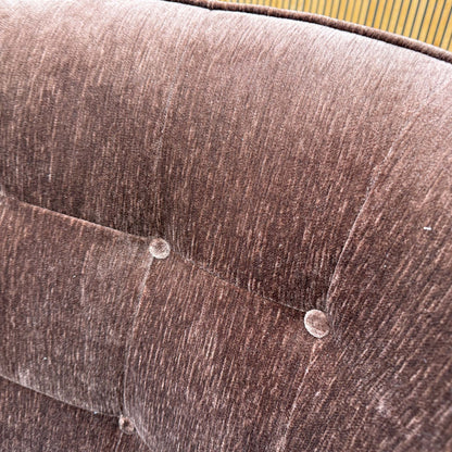 Close-up shot of the California Brown fabric upholstery on the ‘Garland’ chair, showcasing the premium textured weave and warm, rich brown coloration.