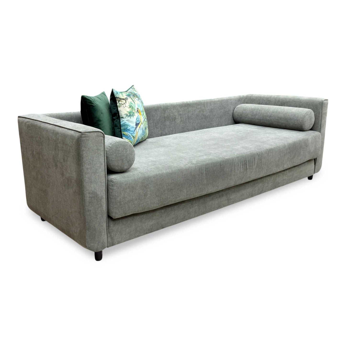 Side profile of the ‘Esprit’ day bed, emphasizing its slim, space-saving track arm design and neat, tailored silhouette.