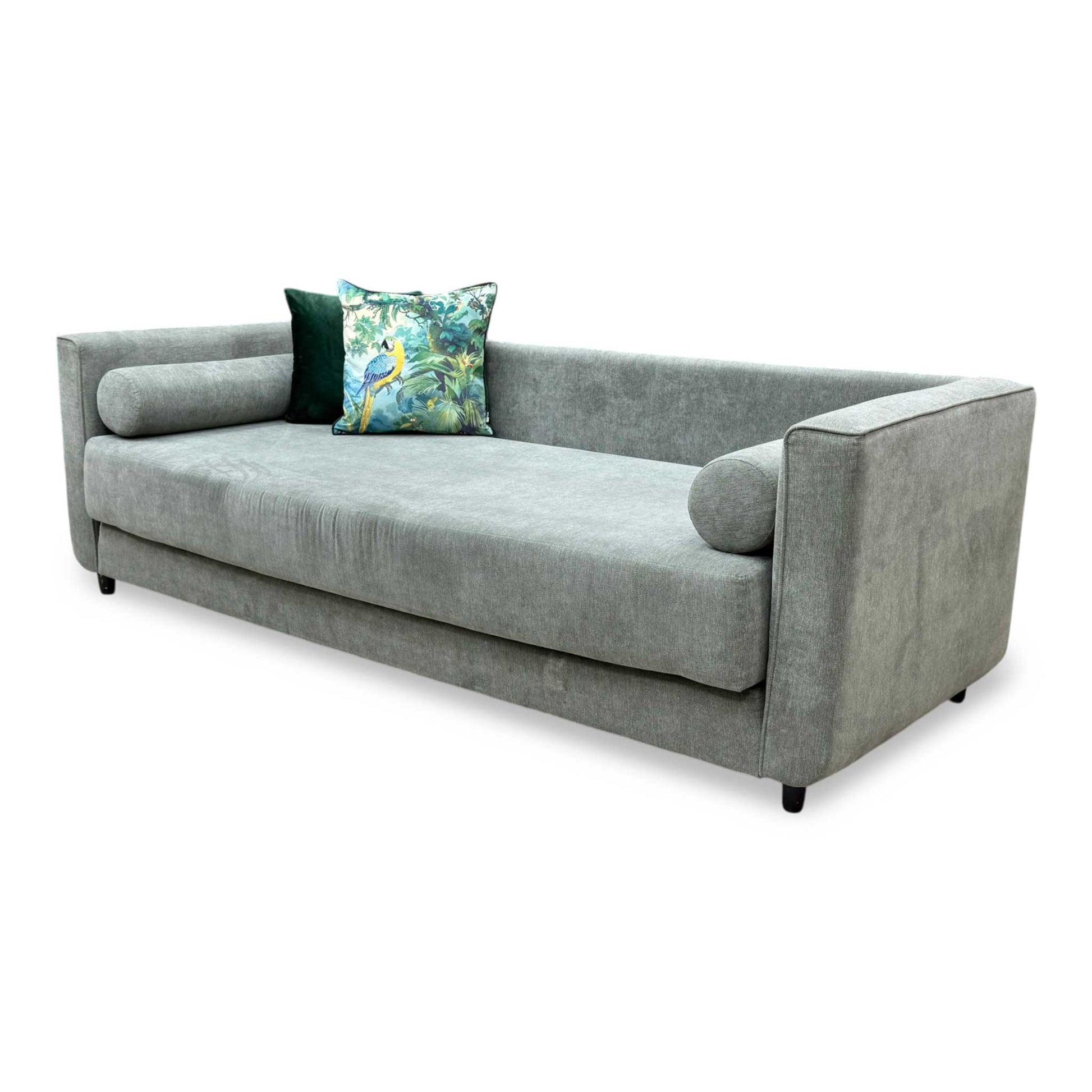 Side profile of the ‘Esprit’ day bed, emphasizing its slim, space-saving track arm design and neat, tailored silhouette.
