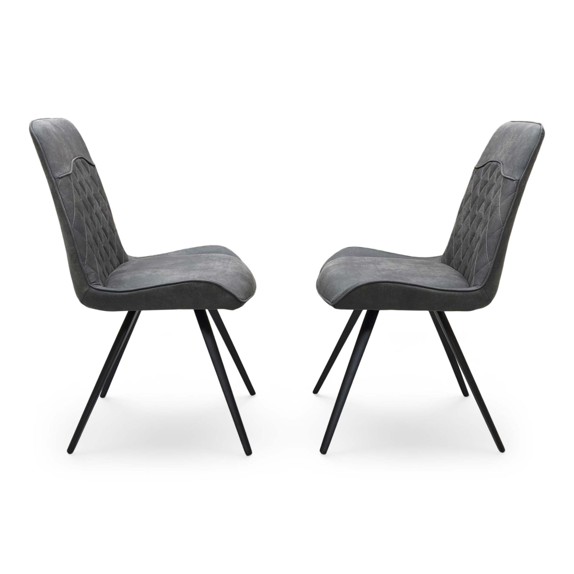 Front view of a pair of ‘Warrior’ Cantilever Dining Chairs in Charcoal Grey fabric, showcasing their sleek contemporary C-shaped frames, vertical channel-stitched backs, and minimalist industrial profile.