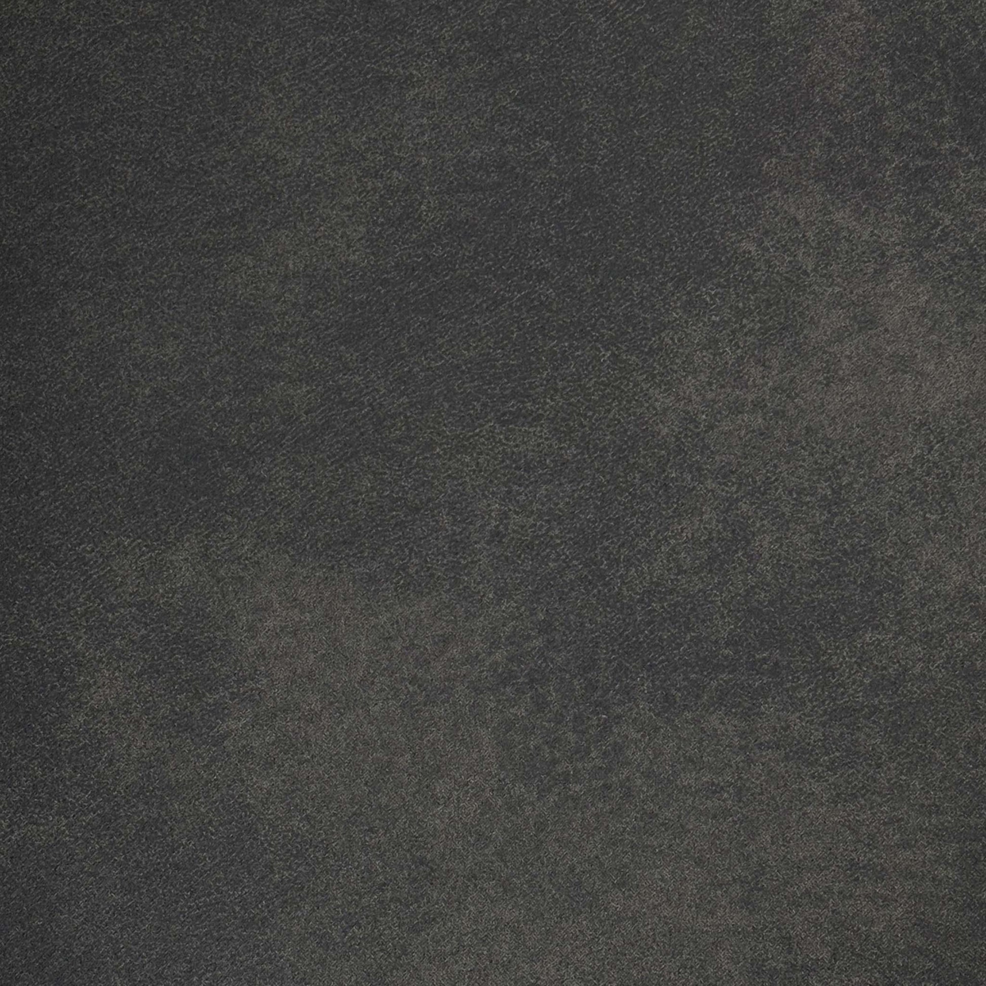 Close-up shot of the Charcoal Grey fabric on the ‘Warrior’ chair, showcasing the neat vertical column stitching, premium tailored edges, and soft, durable textured weave.