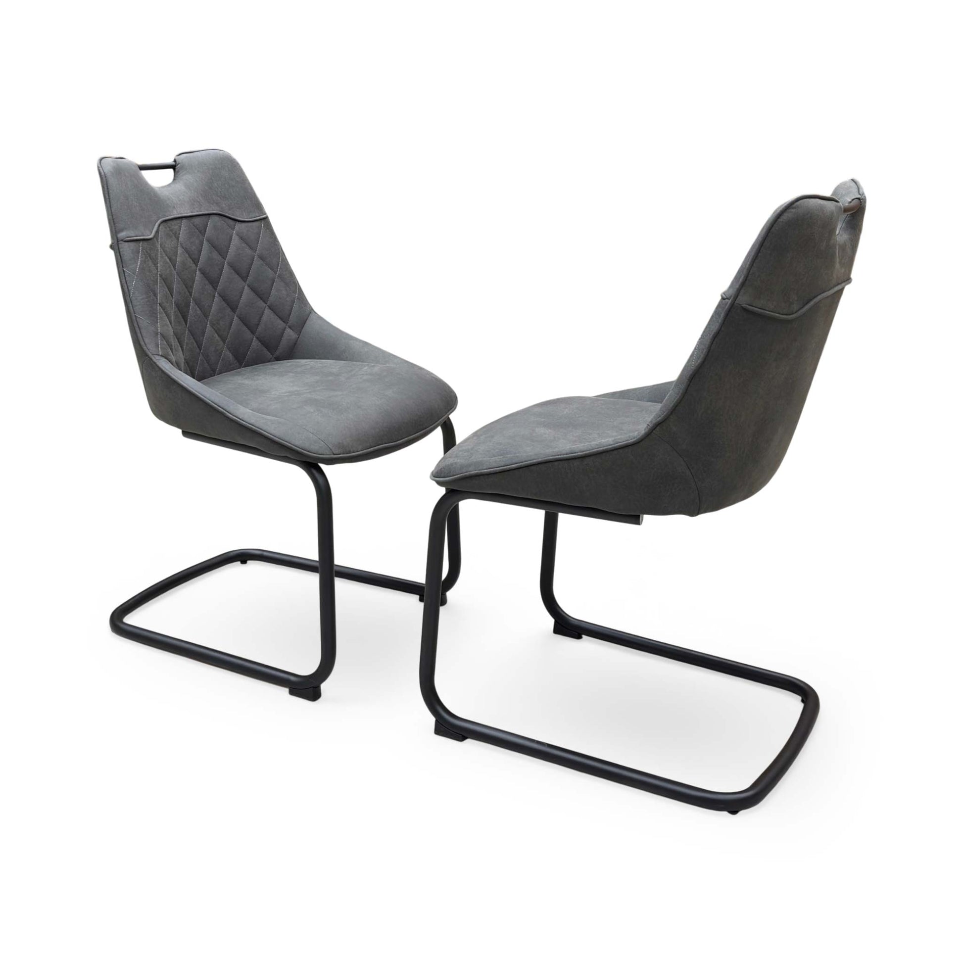 Side profile of the ‘Warrior’ dining chair, highlighting the clean, continuous curve of the matte black powder-coated cantilever base and the ergonomic slant of the backrest.