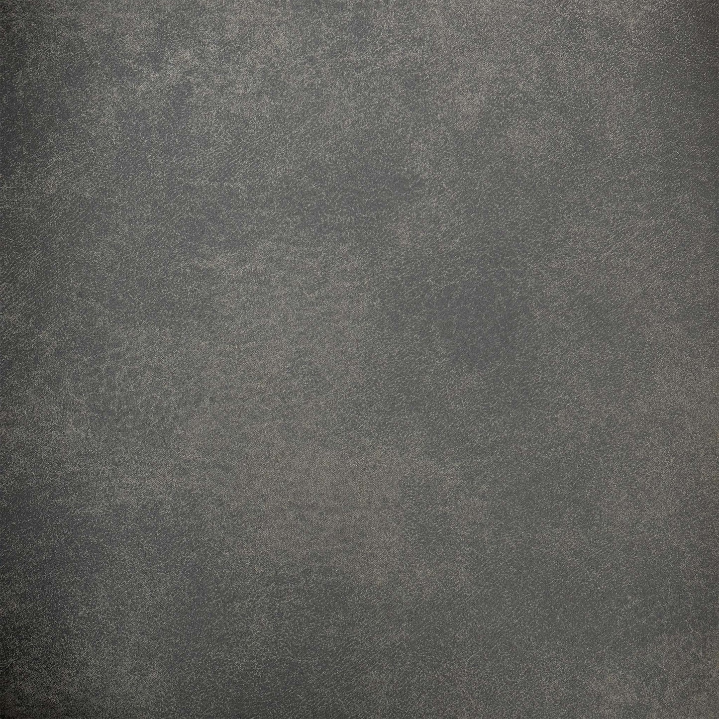 Close-up shot of the Charcoal Grey fabric on the ‘Warrior’ chair, showcasing the neat vertical column stitching, premium tailored edges, and soft, durable textured weave.