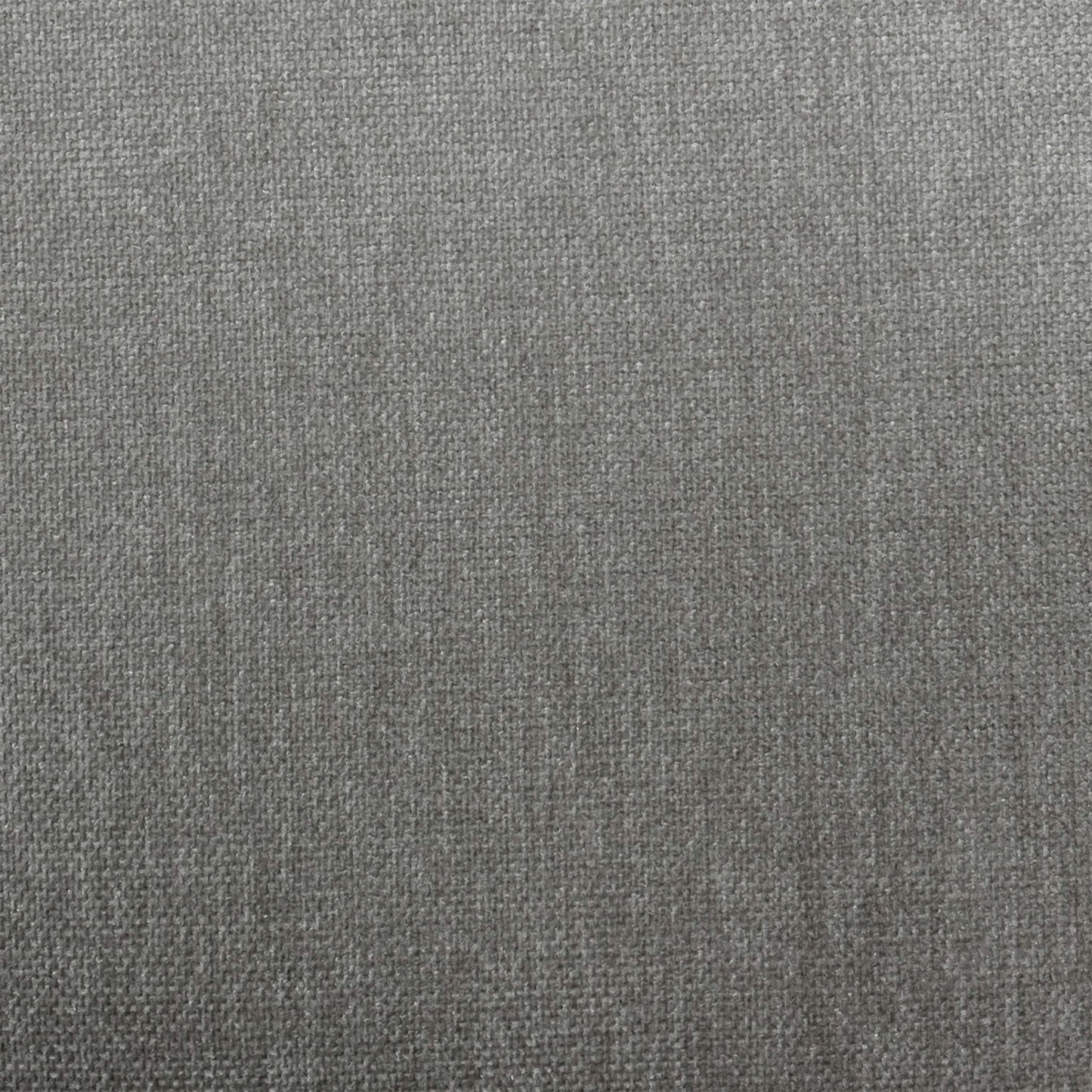 Close-up shot of the light oak surface on the ‘Stockholm’ chair, showcasing the fine natural grain structure, soft organic tones, and protective smooth matte lacquer finish.