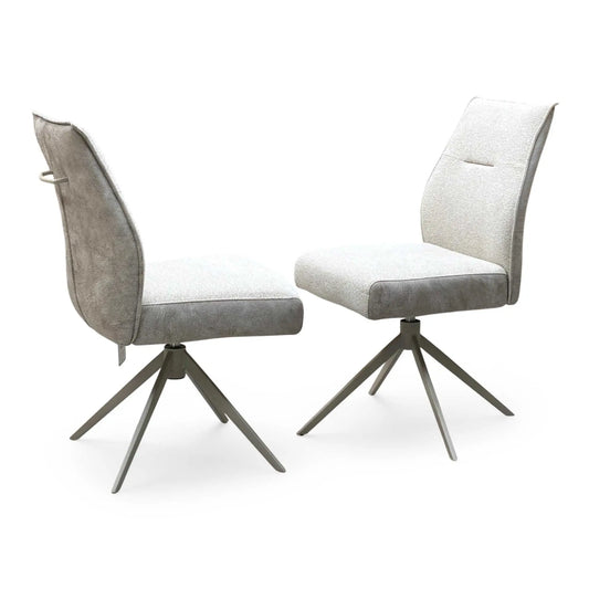 Full View ‘Mirage’ contemporary swivel dining chairs, featuring a matching pair of elegantly curved seats upholstered in high-grade neutral fabric with modern splayed metal legs.