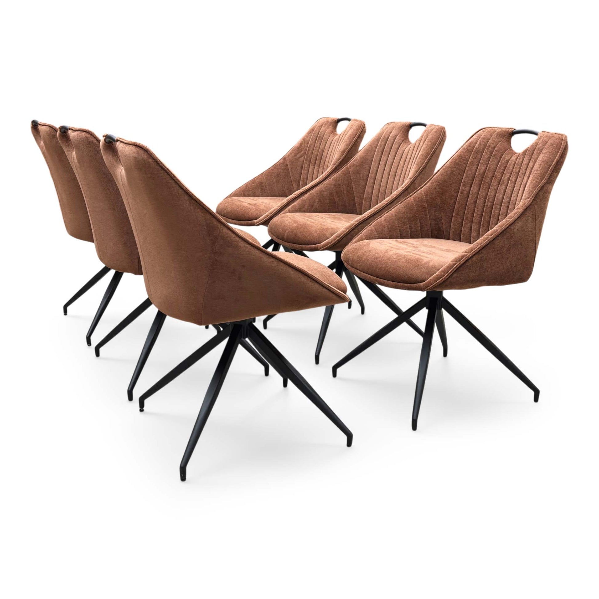 Full view of a set of 6 Furniture Village ‘Jai’ Swivel Dining Chairs in Rust Orange fabric, showcasing their vibrant contemporary bucket seats, vertical stitched detailing, and sleek black metal spider legs.