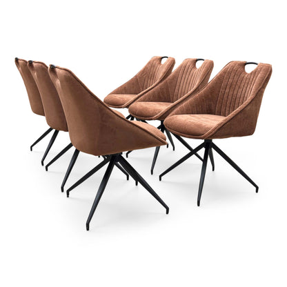 Full view of a set of 6 Furniture Village ‘Jai’ Swivel Dining Chairs in Rust Orange fabric, showcasing their vibrant contemporary bucket seats, vertical stitched detailing, and sleek black metal spider legs.