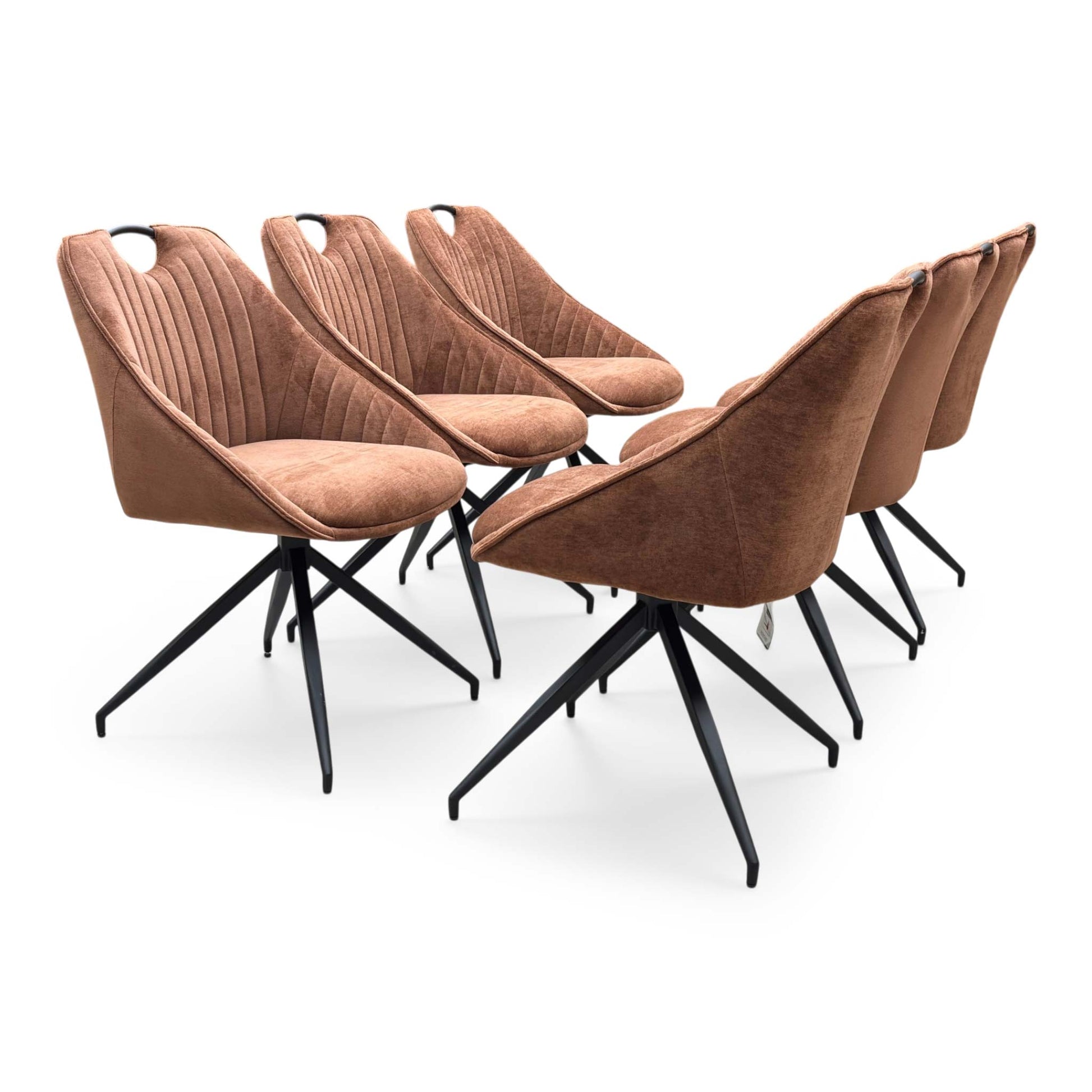 Side profile of the ‘Jai’ dining chair, highlighting its ergonomic wrap-around scoop silhouette, integrated low arms, and clean, angled black metal leg structure.