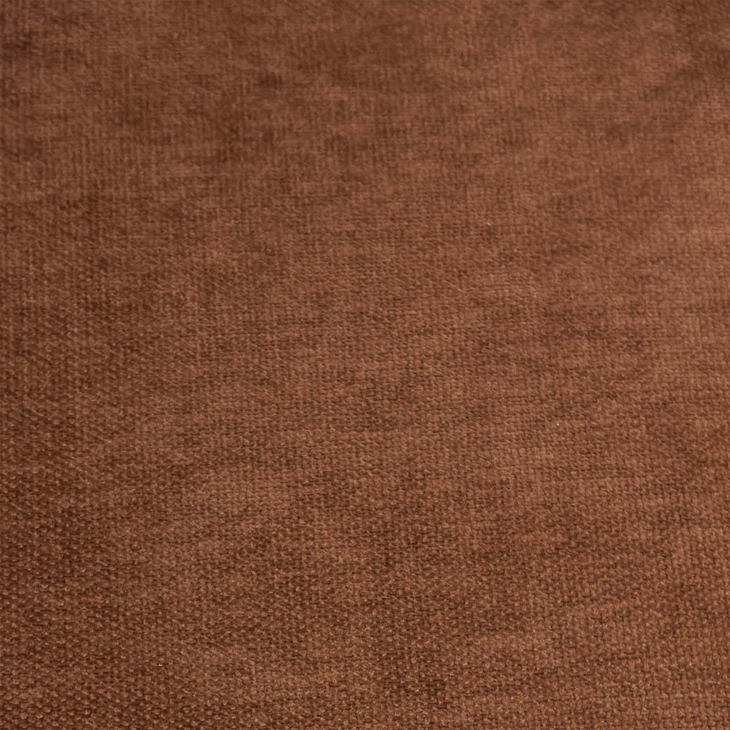 Close-up shot of the Rust Orange fabric on the ‘Jai’ chair, showcasing the neat vertical column stitching, premium tailored edges, and soft, resilient textured weave.