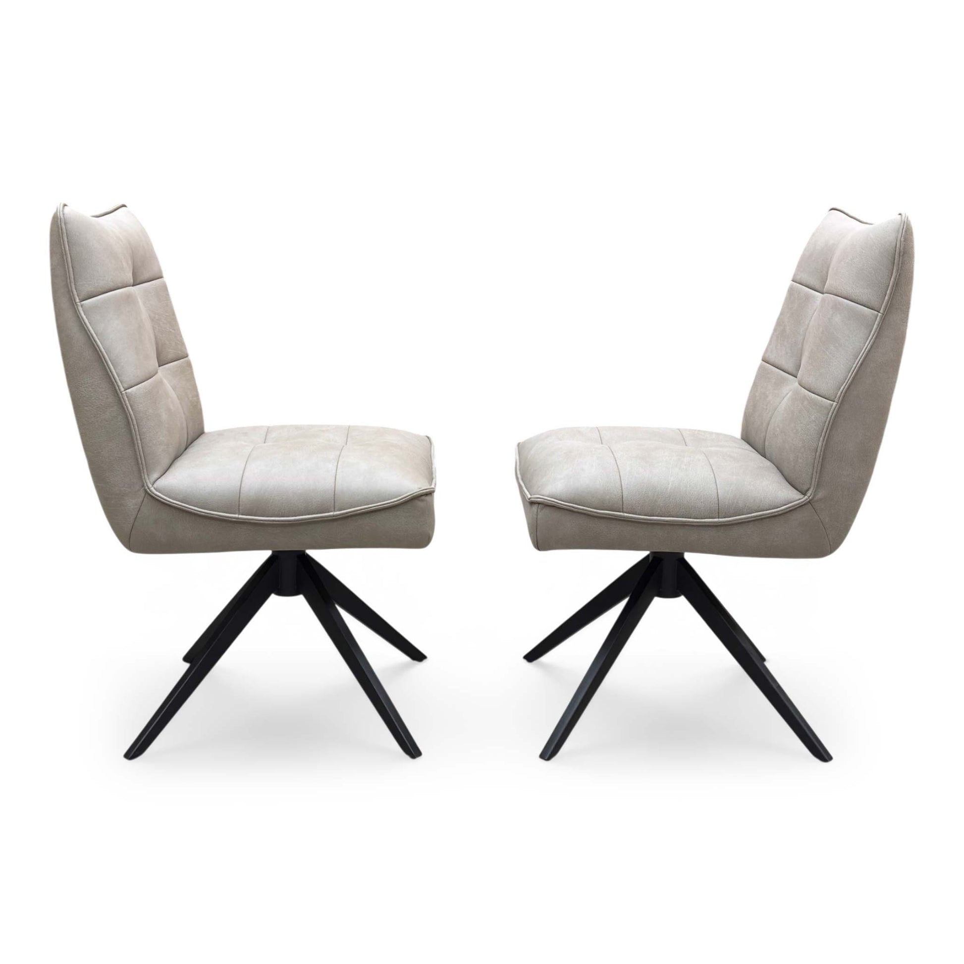 Front view of a pair of ‘Germain’ Swivel Dining Chairs in Taupe faux leather, showcasing their sleek contemporary scoop silhouettes, vertical channel stitching, and elegant black metal legs.