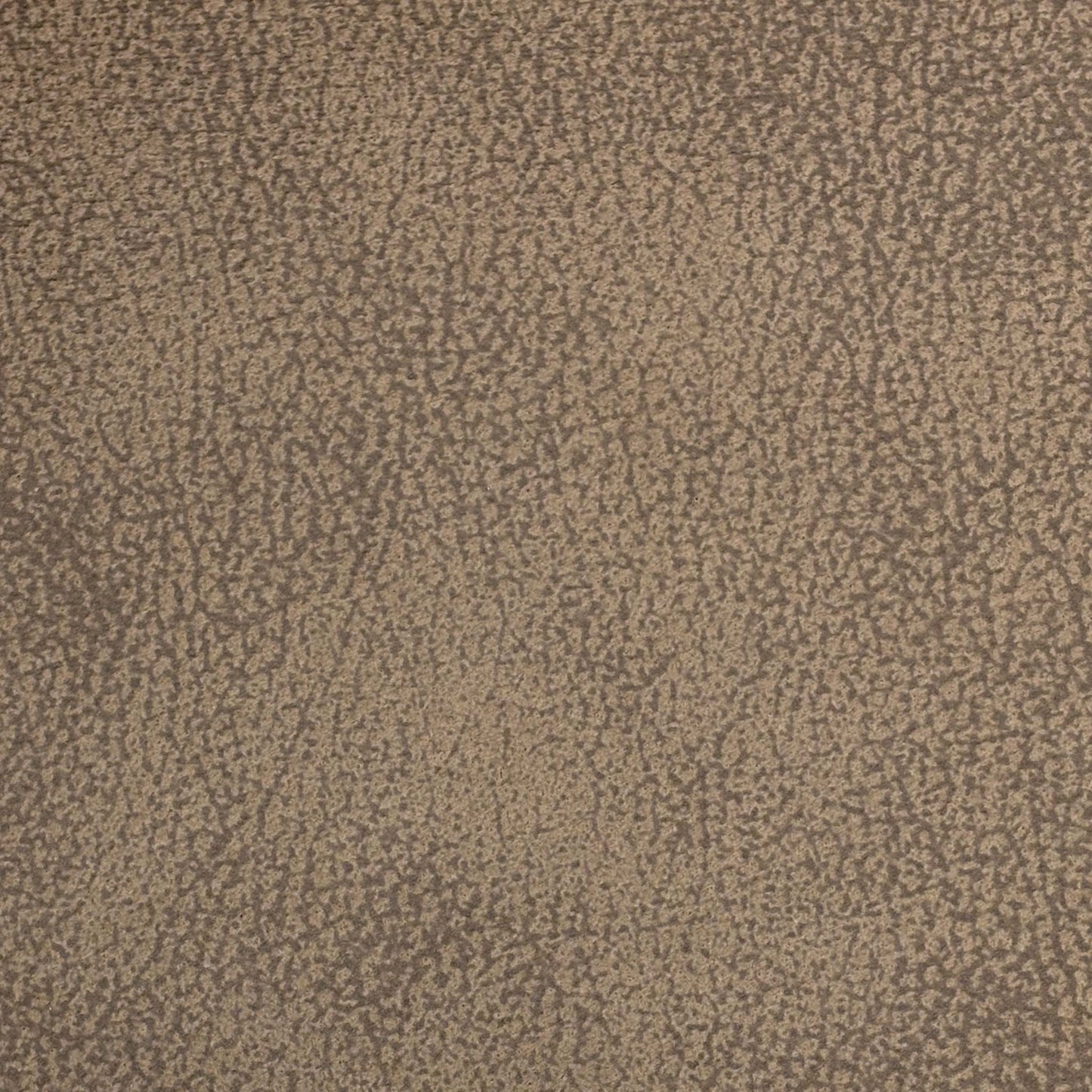 Close-up shot of the Tan Brown faux leather on the ‘Aydin’ chair, showcasing the neat vertical column stitching, premium tailored seams, and realistic distressed leather grain texture.