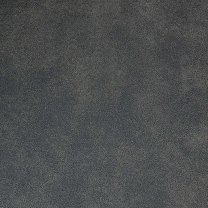 Close-up shot of the Grey Cowboy fabric on the ‘Augusta’ dining chair, showcasing the intricate diamond quilting pattern, premium contrast stitching, and rugged, distressed faux-leather finish.