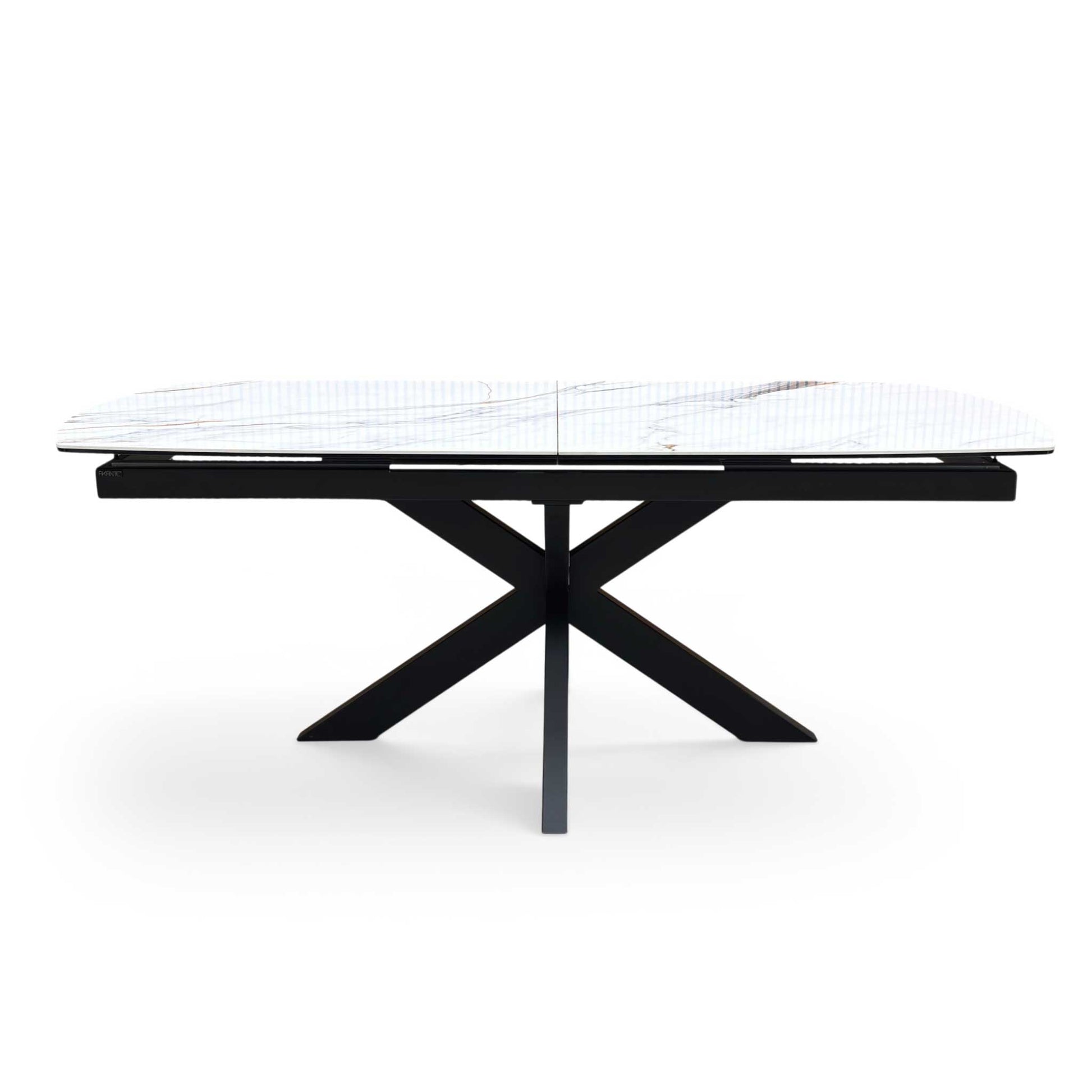 Front view of the Furniture Village ‘Raul’ Pop-Up Extending Dining Table, showcasing its luxurious Fiorentino white marble-effect ceramic top and striking black star-burst metal legs.