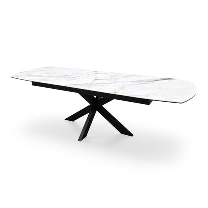 Side profile of the ‘Raul’ modern dining table, highlighting the slim, low-profile ceramic tabletop edge and the clean angles of the black powder-coated legs.