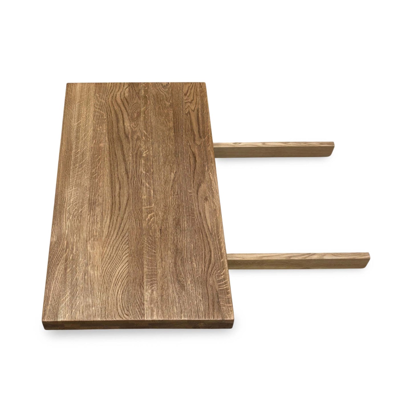 Side view of the Earth solid oak dining table extension leaf, illustrating the heavy-duty metal insertion prongs and secure mounting hardware.