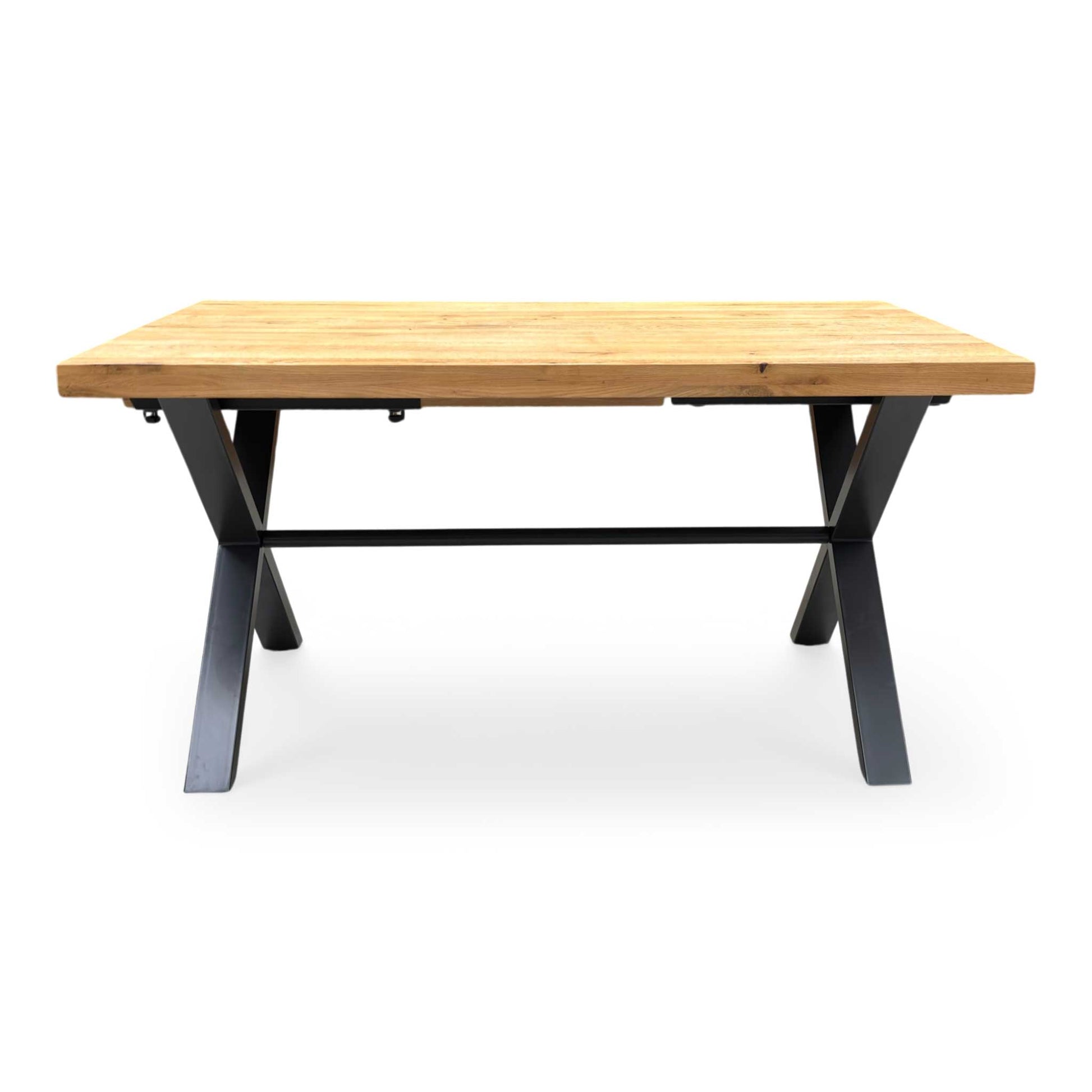 Front  profile of the ‘Earth’ industrial dining table, highlighting the clean, angular lines of the grey metal X-frame legs and the sturdy overhanging oak top.
