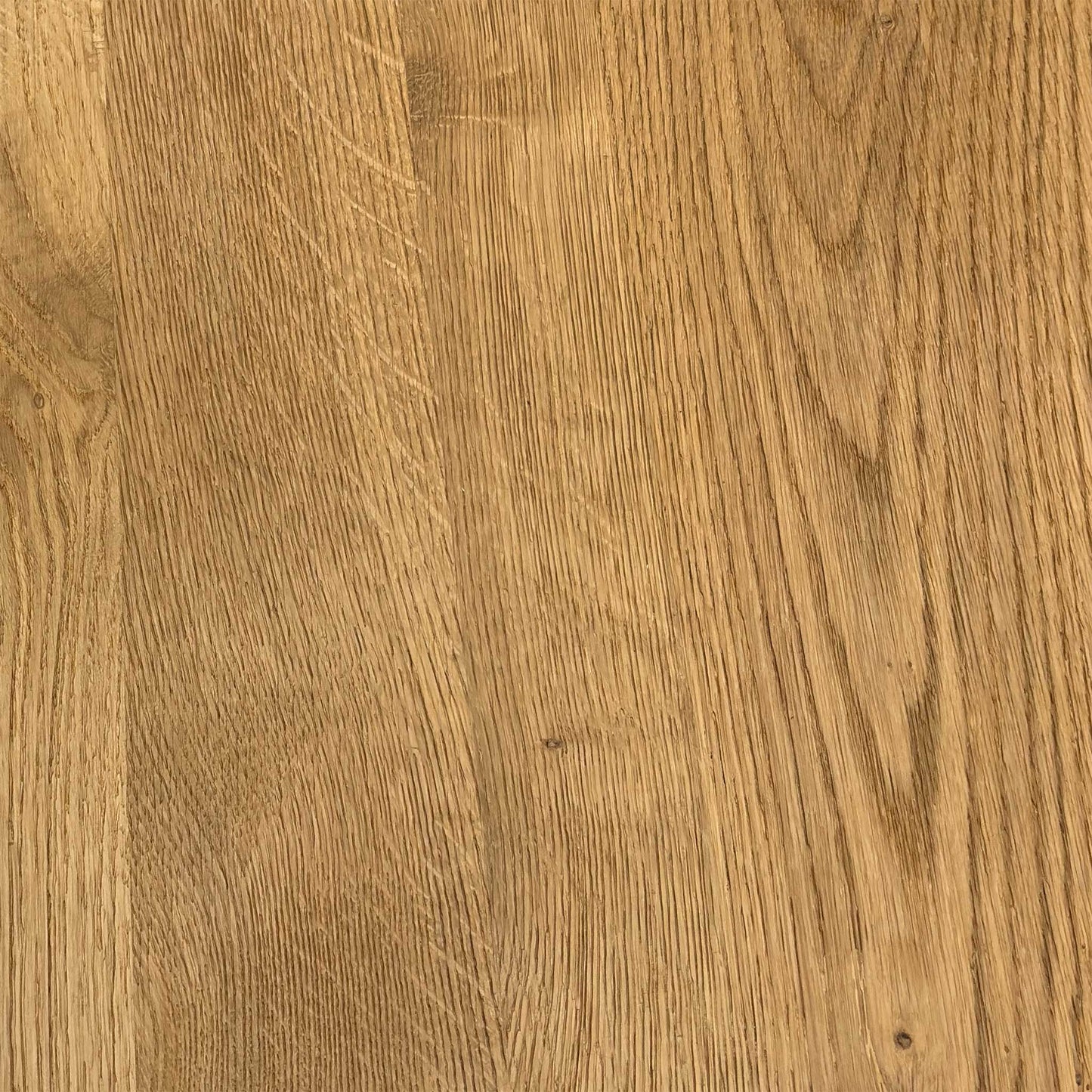 Close-up shot of the solid natural oak table top on the ‘Earth’ dining table, showcasing the rich wire-brushed texture, distinctive natural character markings, and oiled finish.