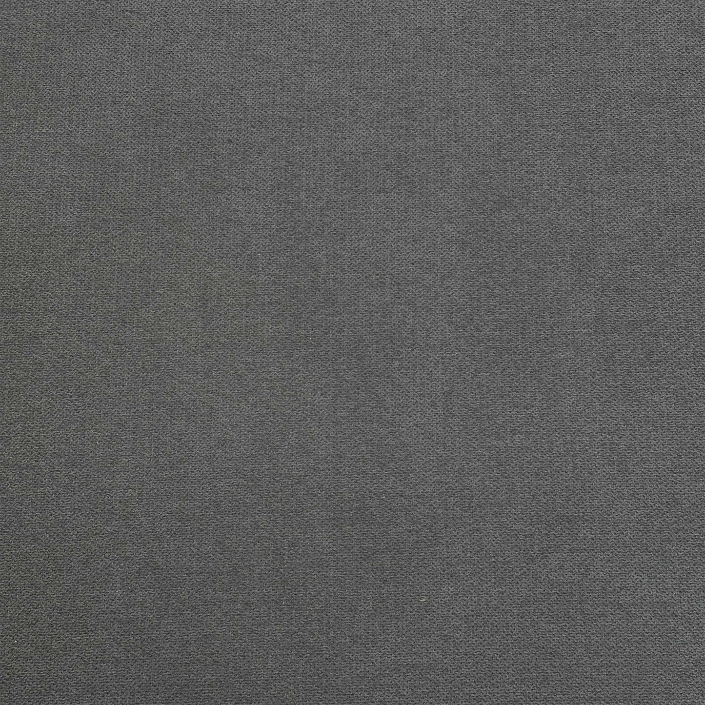 Close view of the Comfi storage footstool upholstery, emphasizing the high-quality light grey fabric weave and deep, precise button-tufted cushioning.