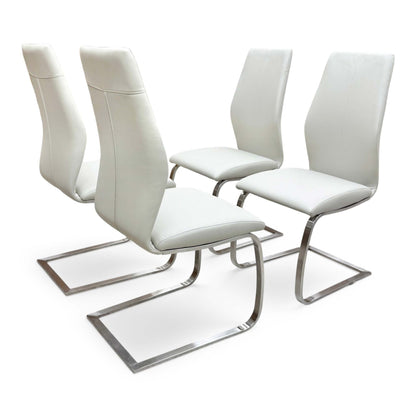 Full view of a set of 4 'Elis' modern cantilever dining chairs in taupe faux leather, featuring a sleek brushed stainless steel C-shaped base.