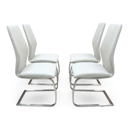 Side view for the Elis taupe dining chairs, highlighting the wipe-clean faux leather upholstery, ergonomic back support, and sturdy cantilever frame.