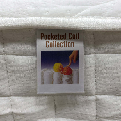 Macro view of the Comfort Pocket 1000 mattress surface, emphasizing the soft-touch knitted fabric weave, breathable stitching patterns, and premium tufted finish.