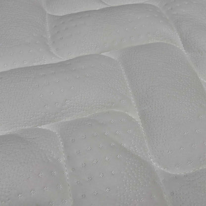 Macro view of the Comfort Pocket 1000 mattress surface, emphasizing the soft-touch knitted fabric weave, breathable stitching patterns, and premium tufted finish.