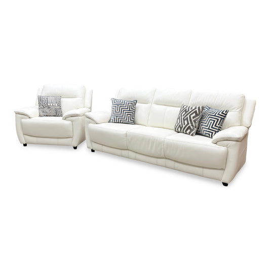 Full view of the World of Leather Touch 3-seater sofa and matching armchair in Star White leather, showcasing a clean, contemporary design with premium stitched panels.
