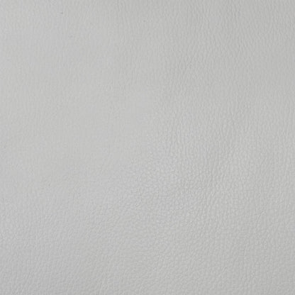 Close up view of the Touch NC-744D Star White leather upholstery, emphasizing the high-quality grain texture, supple finish, and durable linear accent stitching.