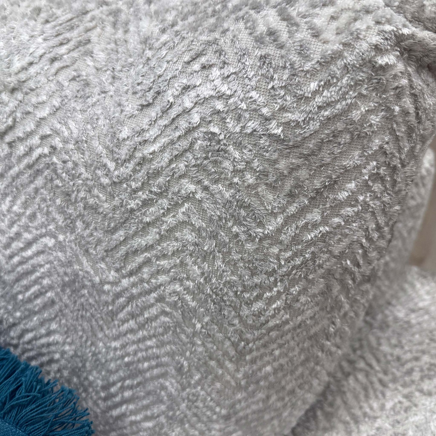 High-definition close-up macro view of the Chevron Silver upholstery fabric, detailing the premium woven textile texture, durable thread density, and stylish geometric zig-zag pattern.