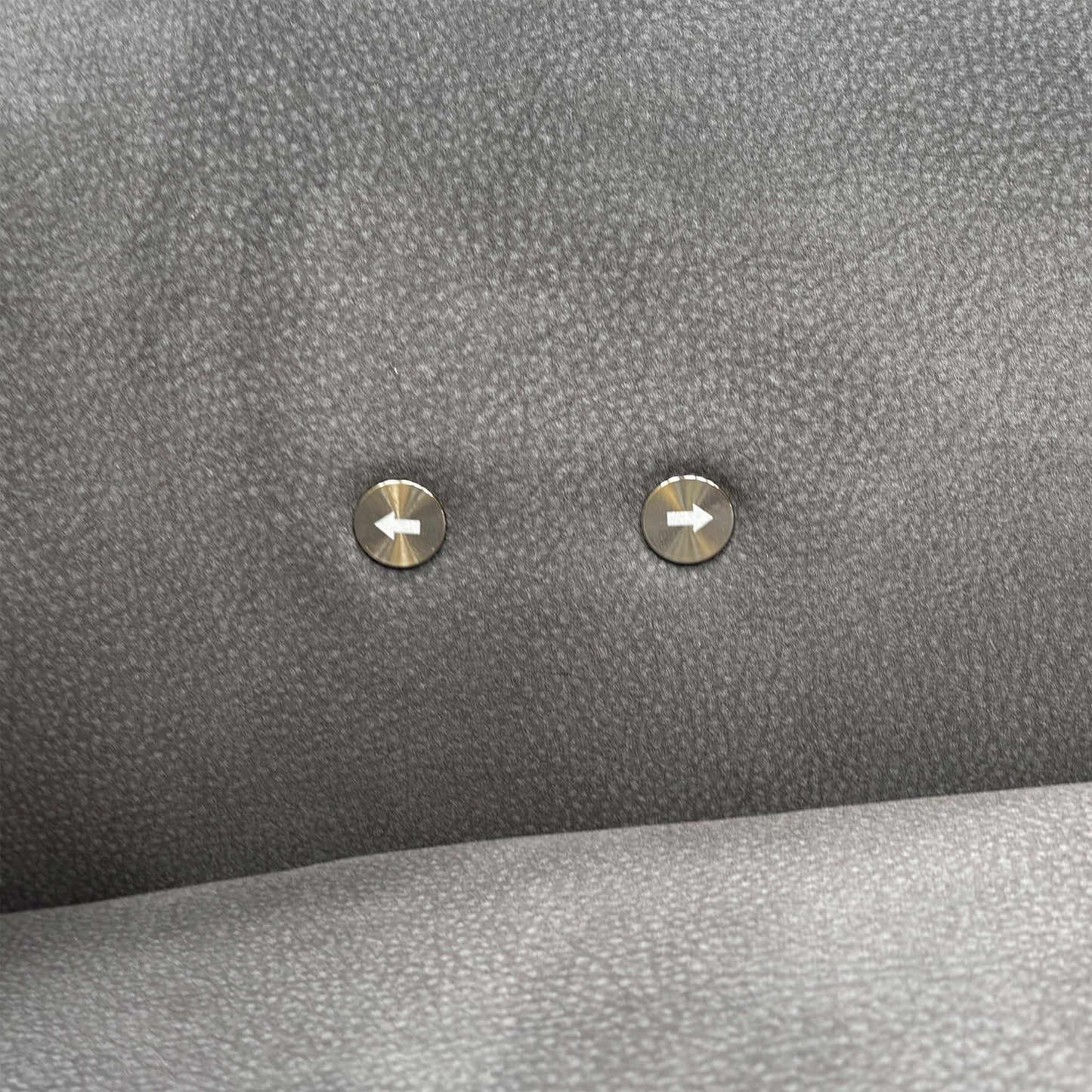 Close view of the Flex SFA-PEY-R08 graphite grey fabric upholstery, highlighting the durable woven texture, tight contrast stitching, and premium finish.