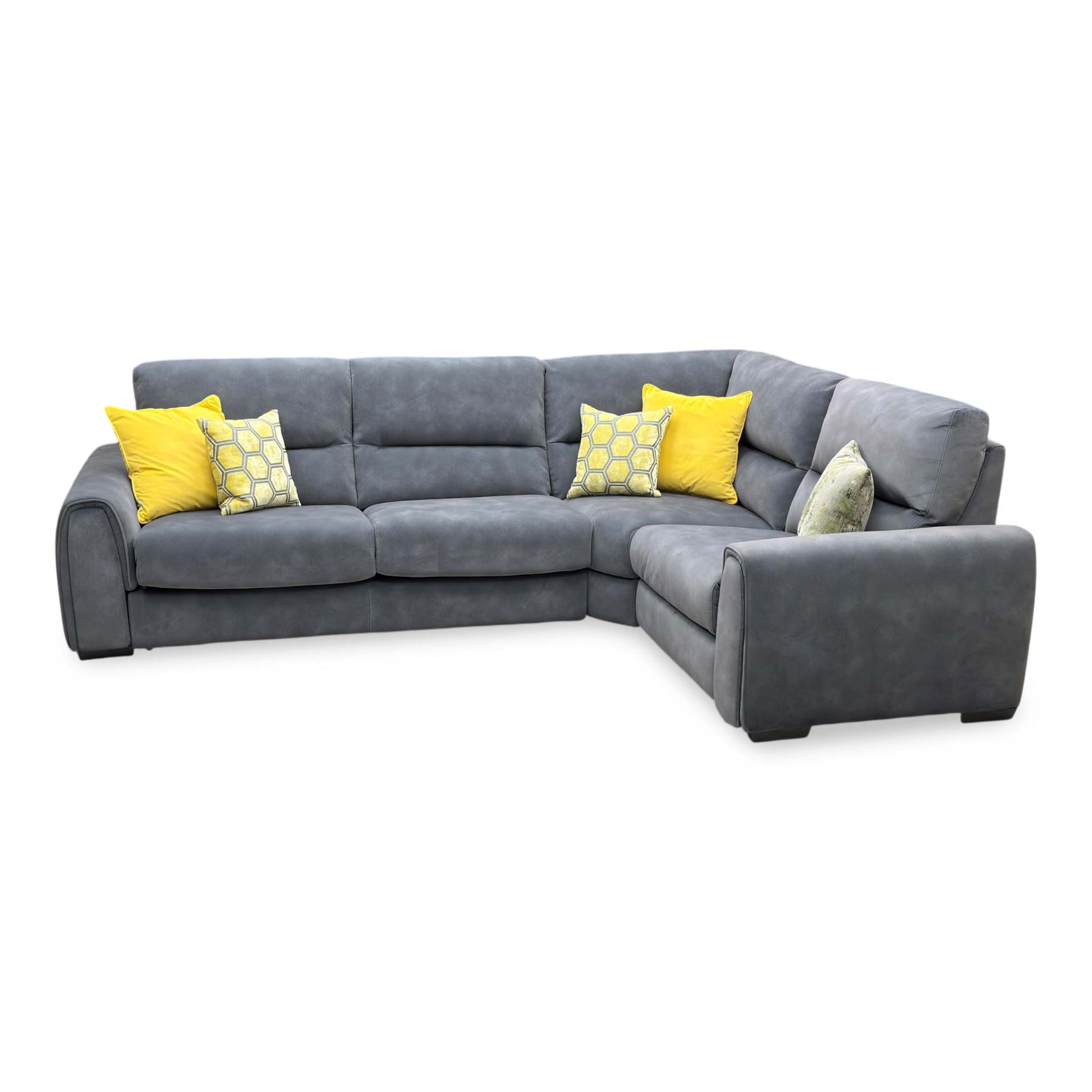 Side profile view of the Flex corner sofa, illustrating the depth of the chaise lounge section, supportive armrest cushioning, and sleek low-profile feet.