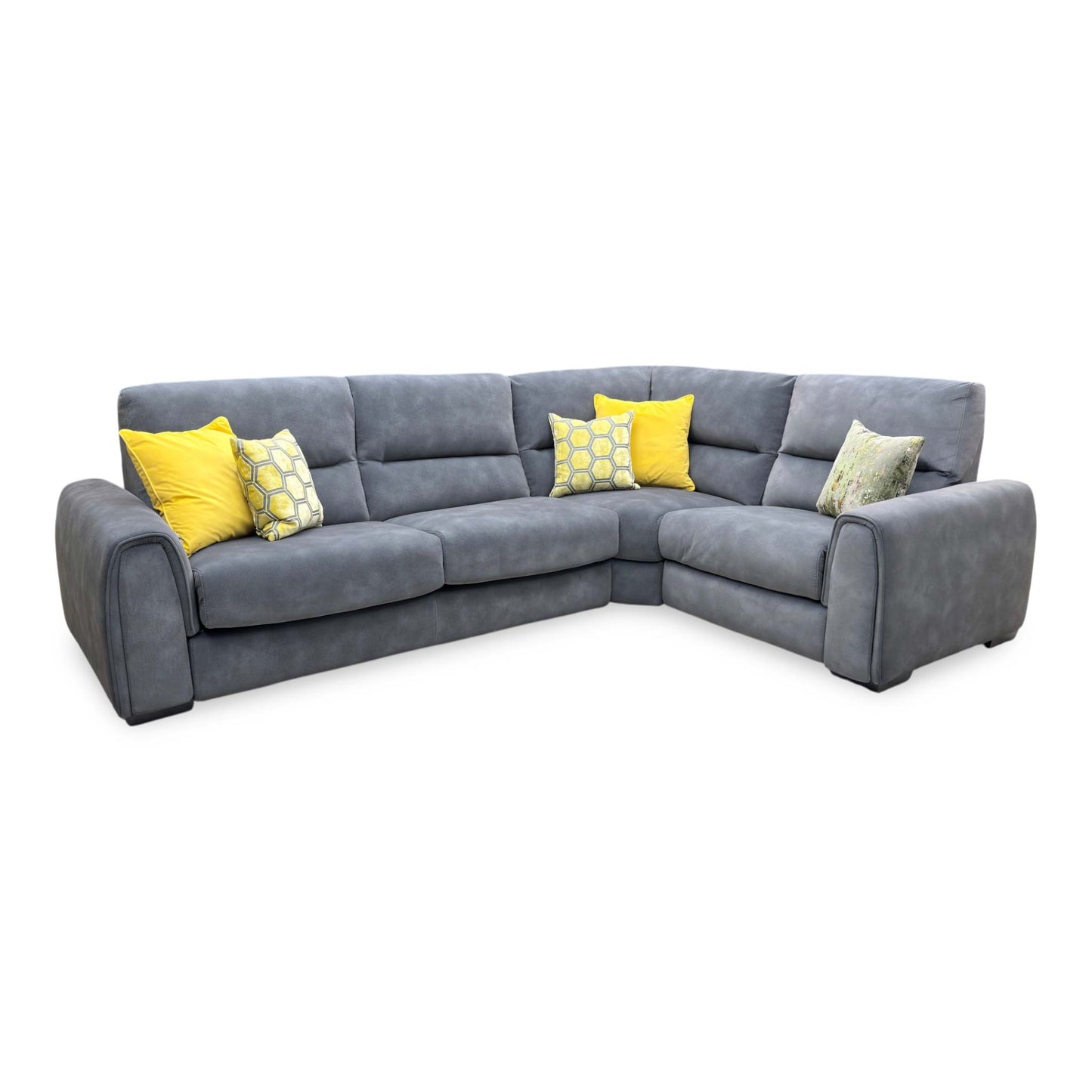 Side profile view of the Flex corner sofa, illustrating the depth of the chaise lounge section, supportive armrest cushioning, and sleek low-profile feet.