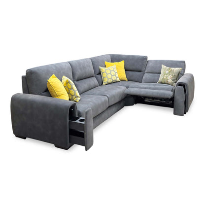 Side profile view of the Flex corner sofa, illustrating the depth of the chaise lounge section, supportive armrest cushioning, and sleek low-profile feet.