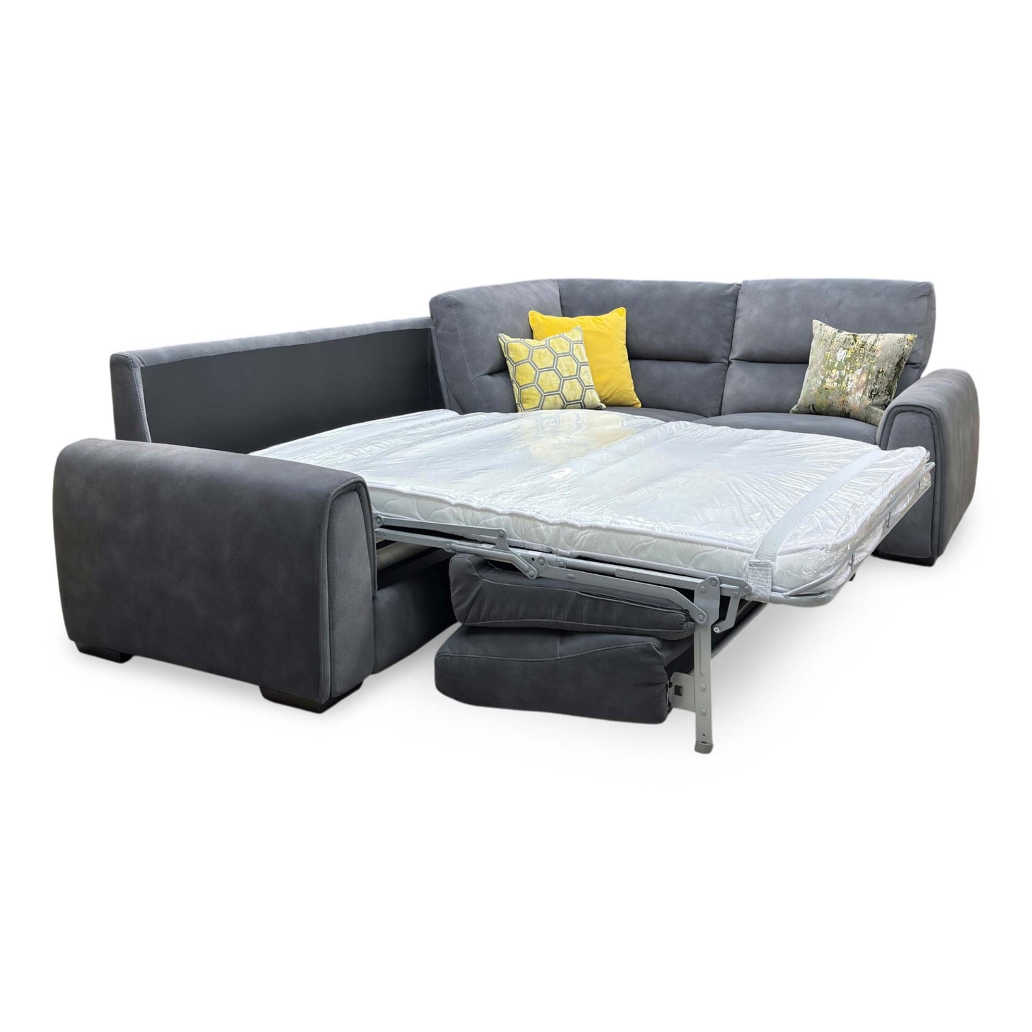 Side profile view of the Flex corner sofa, illustrating the depth of the chaise lounge section, supportive armrest cushioning, and sleek low-profile feet.