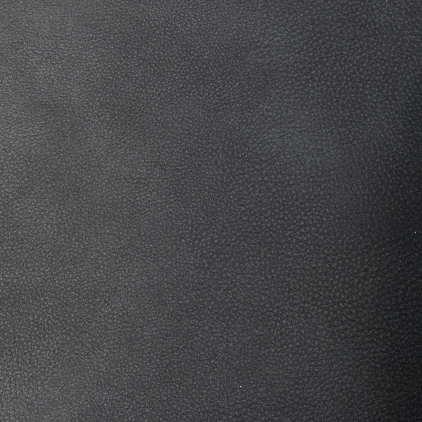 Close up view of the Flex graphite grey fabric corner sofa bed, showcasing clean, fully upholstered back panels suitable for placement in open-plan rooms.