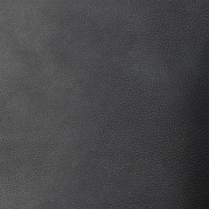 Close up view of the Flex graphite grey fabric corner sofa bed, showcasing clean, fully upholstered back panels suitable for placement in open-plan rooms.