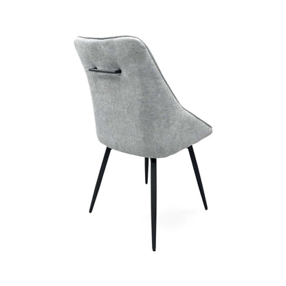 Crete silver fabric swivel dining chair from the rear left, showing the back handle