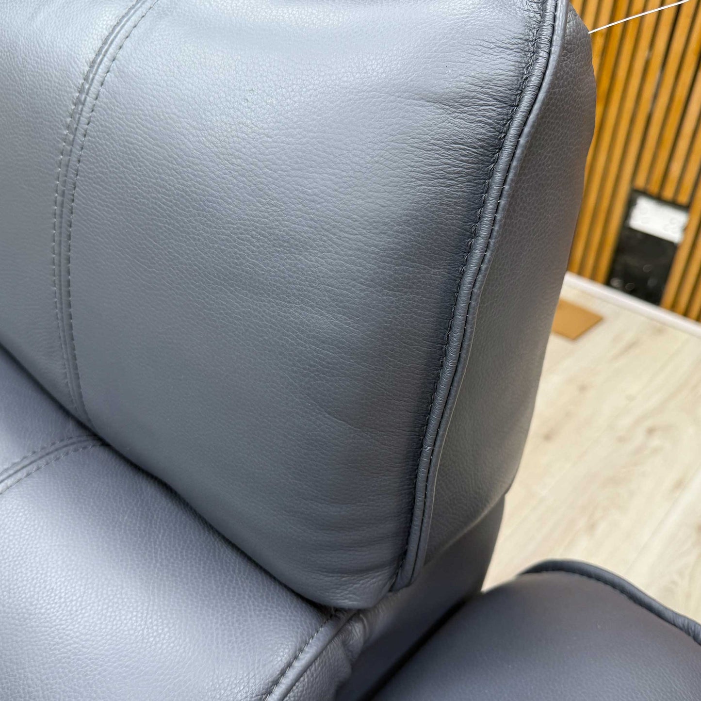 Close-up macro view detailing the Montana lavender grey leather, highlighting its high-grade fine grain texture, soft supple surface, and unique muted color tone.