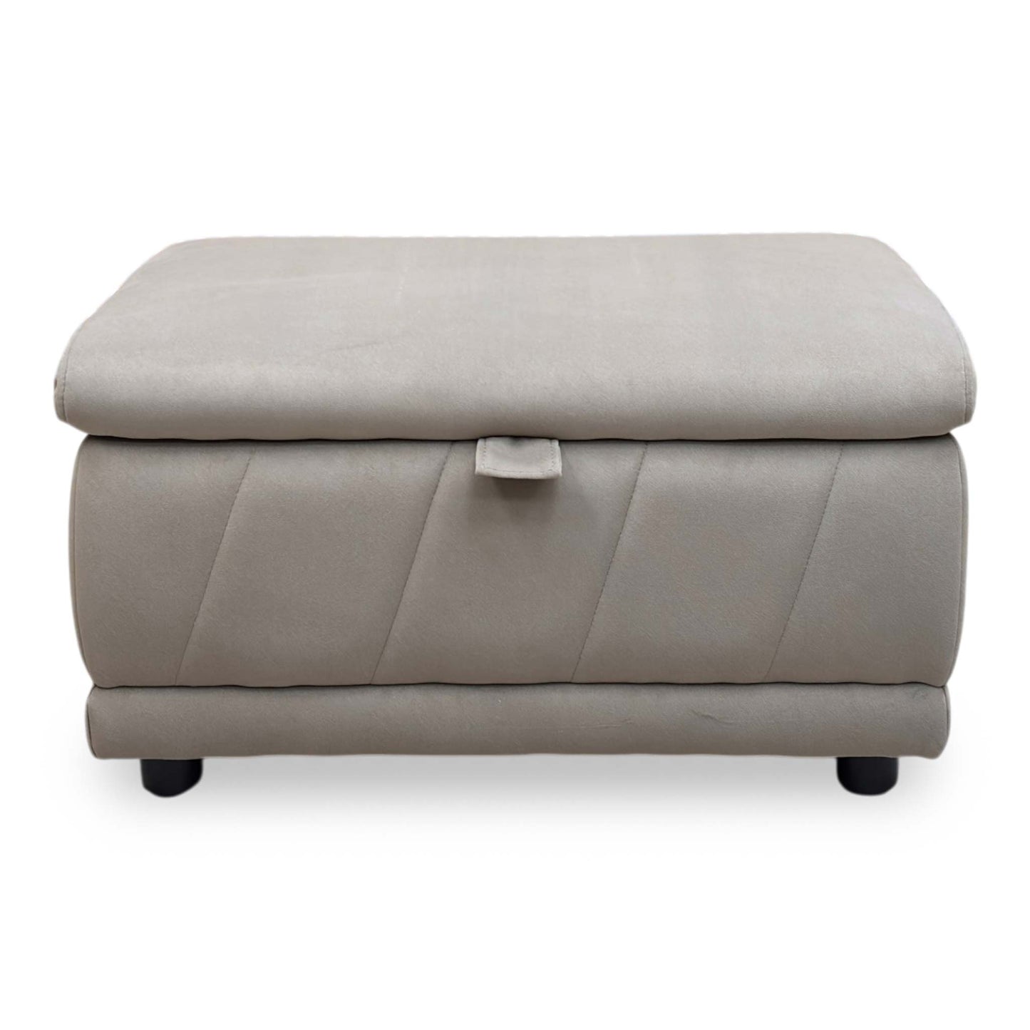 Front View demonstrating the footstool's uniform height, clean linear proportions, and tightly upholstered base paneling.