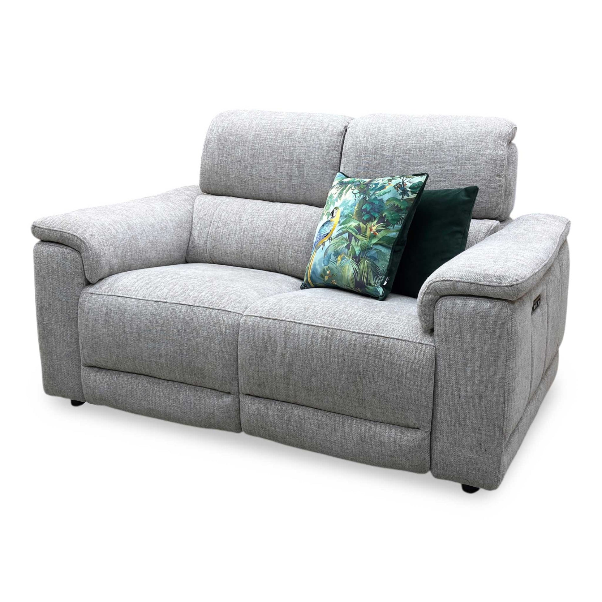 Angle view demonstrating the sofa's deep seating proportions, comfortable arm cushion slope, and clean wall-away clearance reclining architecture.